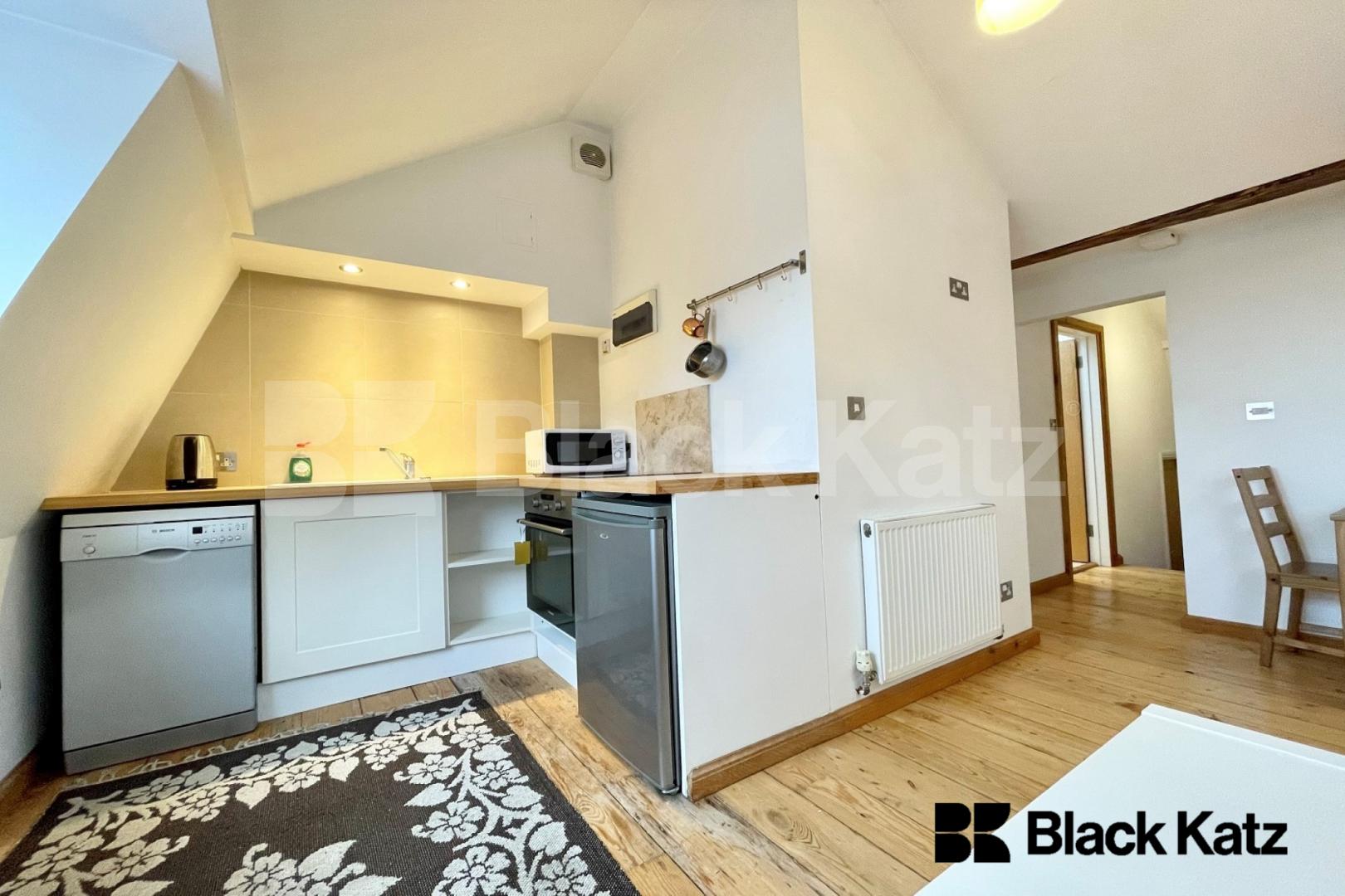  top floor conversion boasts stylish decor throughout and an abundance of light Surrey Square, Elephant & Castle